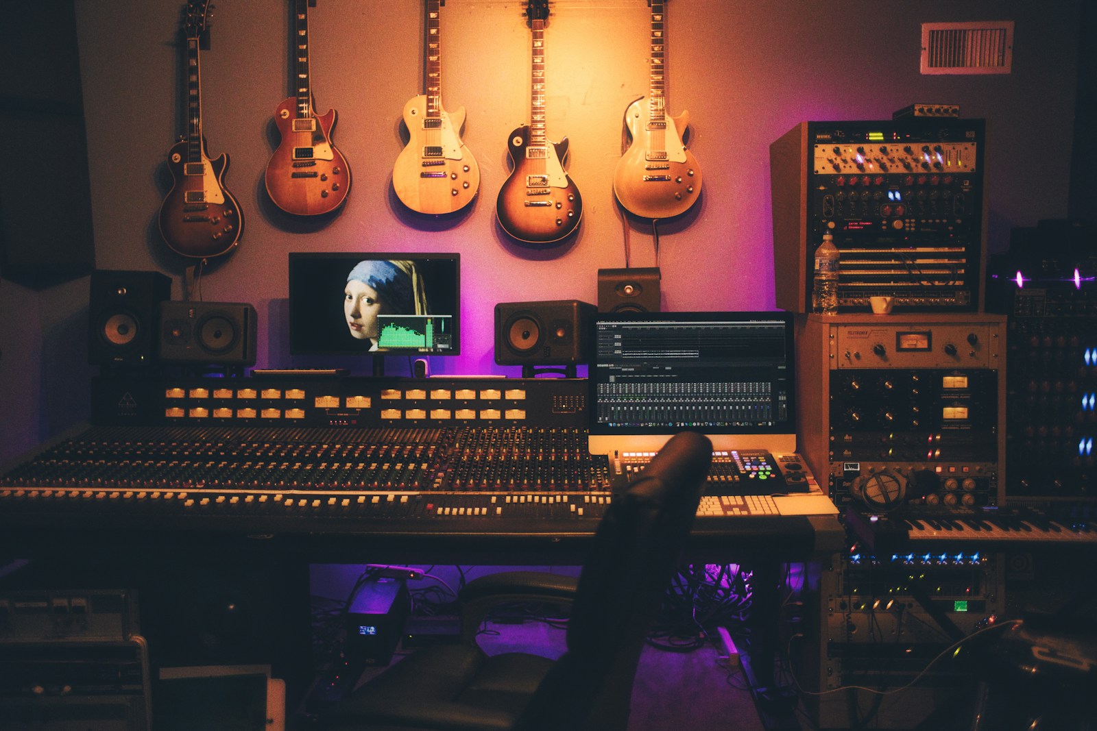 Microphone and headphones in a home recording setup